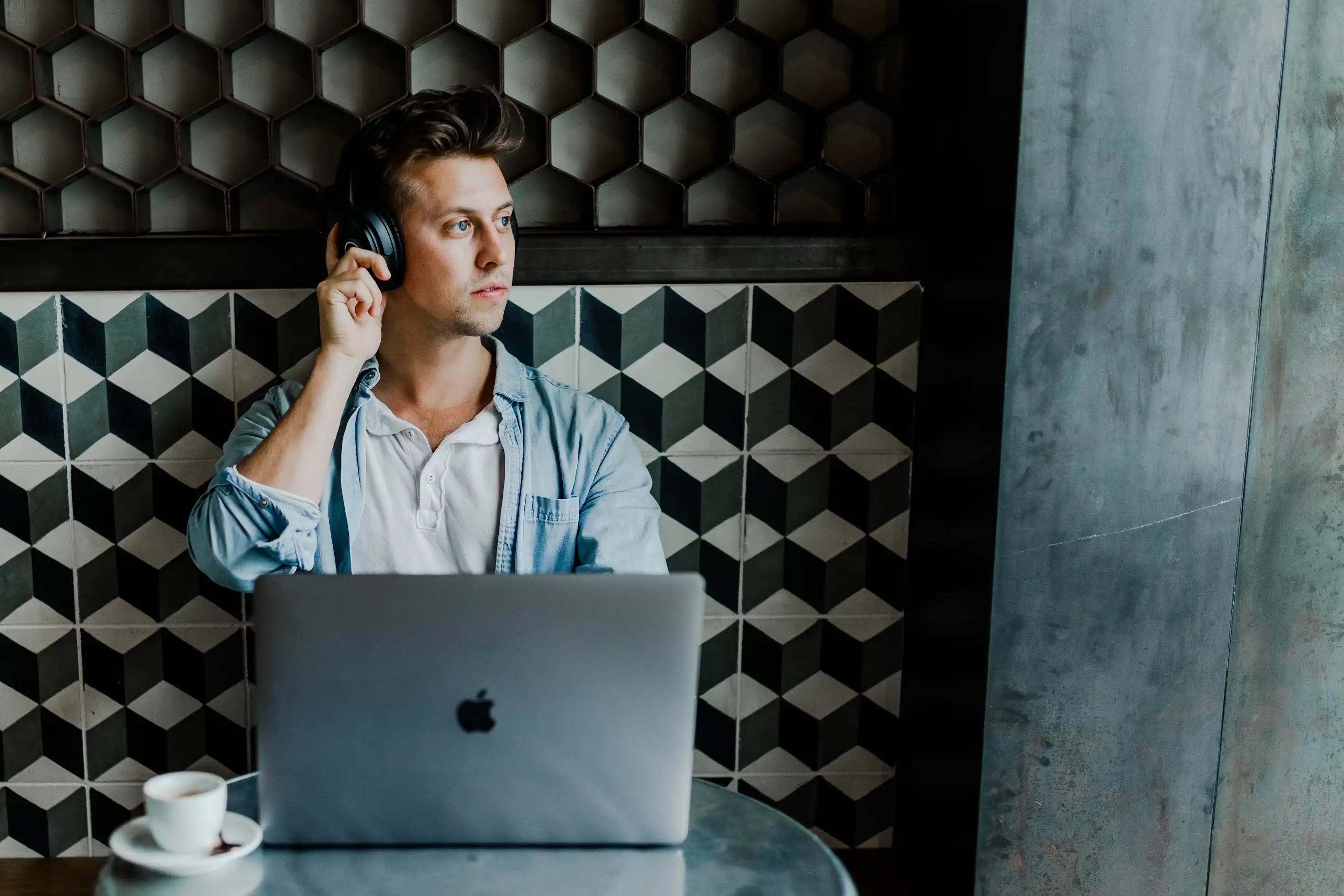 a person on a call using macbook